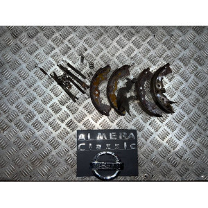 Колодки ручника тормозные Nissan Almera Classic (B10) (2006-2012) 1,6 АКПП 4406095F0A