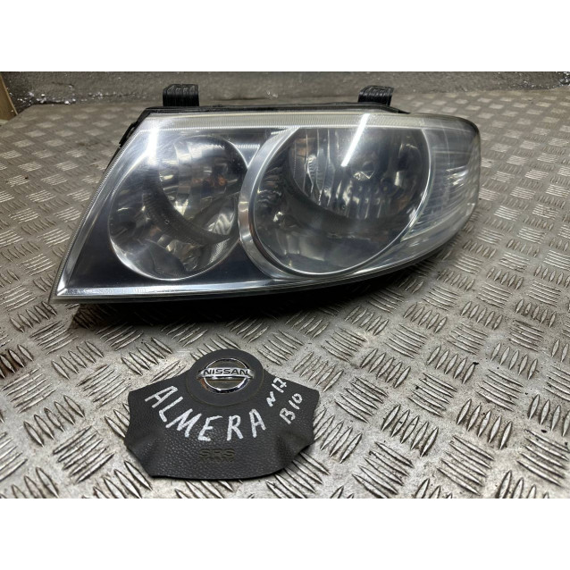 Фара левая Nissan Almera Classic B10 (2006-2012) 2606095F0B