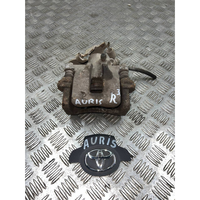 Супорт задній правий Toyota Auris (2006-2012) 4783002100