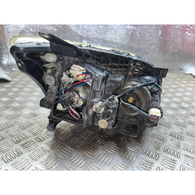 Фара левая Toyota Avensis T25 (-2006) 8117005190