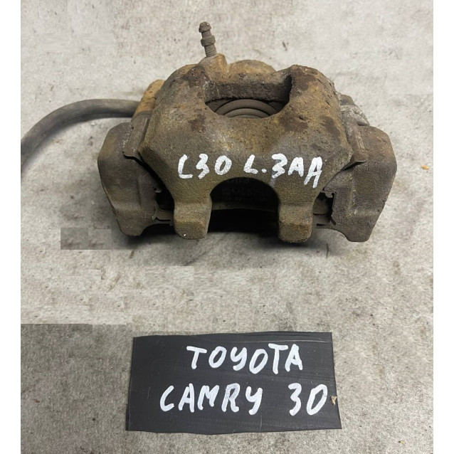 Супорт задній лівий Toyota Camry 30 (2001-2006) 4775048040