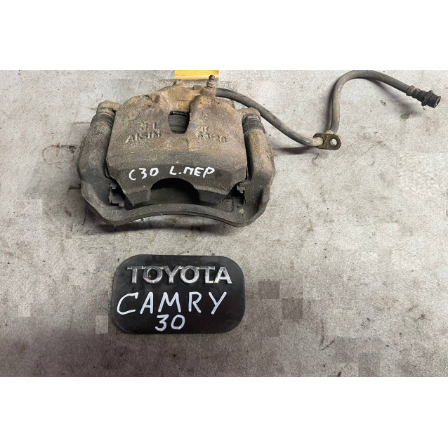 Супорт передній лівий Toyota Camry 30 (2001-2006) 4775033200 4775033190 