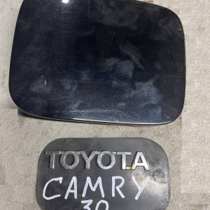 Лючок бензобака Toyota Camry 30 (2001-2006) 7735033080