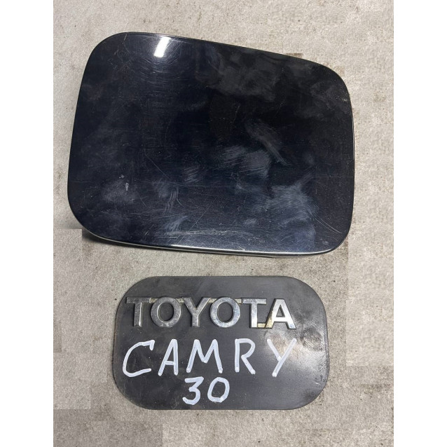 Лючок бензобака Toyota Camry 30 (2001-2006) 7735033080