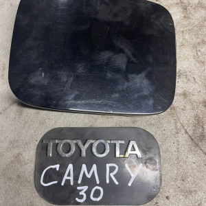 Лючок бензобака Toyota Camry 30 (2001-2006) 7735033080