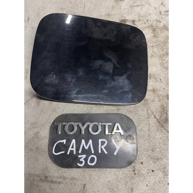 Лючок бензобака Toyota Camry 30 (2001-2006) 7735033080