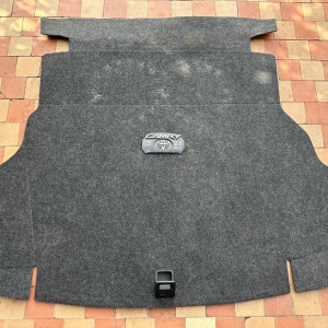 Обшивка облицовка багажника Toyota Camry 55 (2015-2018) 6477006290C0