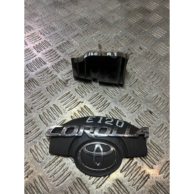 Кронштейн (направляющая) заднего бампера правый под фонарьToyota Corolla E12 (2000-2006) 5256302010