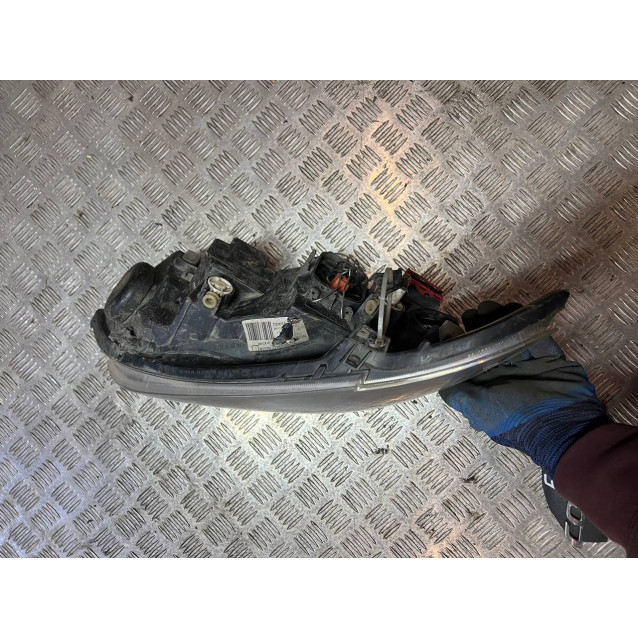 Фара левая Toyota Corolla E12 (2000-2006) 8117002150