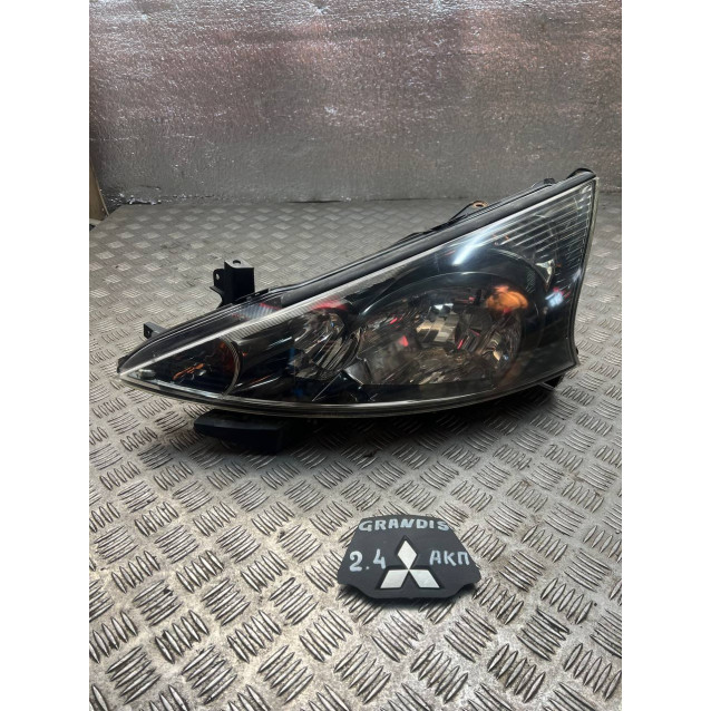 Фара левая Mitsubishi Grandis (2004-2010) 8301A075 8301A573