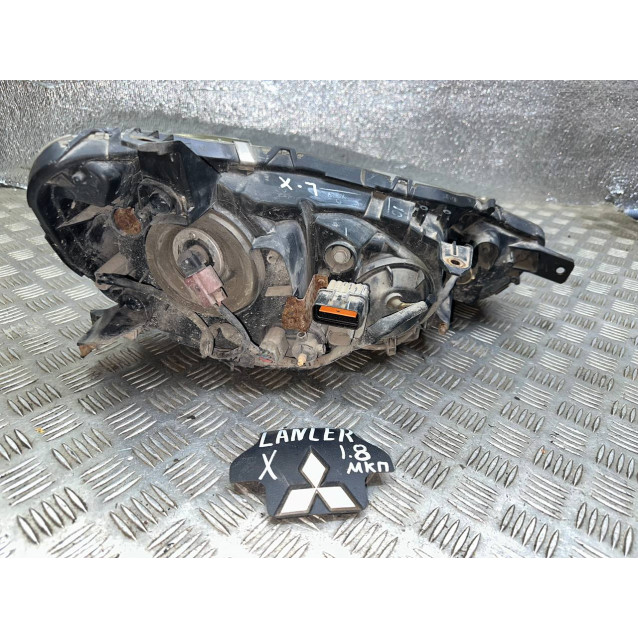 Фара левая Mitsubishi Lancer X (07-13) 8301B259 *царапины