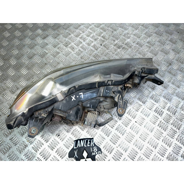 Фара левая Mitsubishi Lancer X (07-13) 8301B259 *царапины