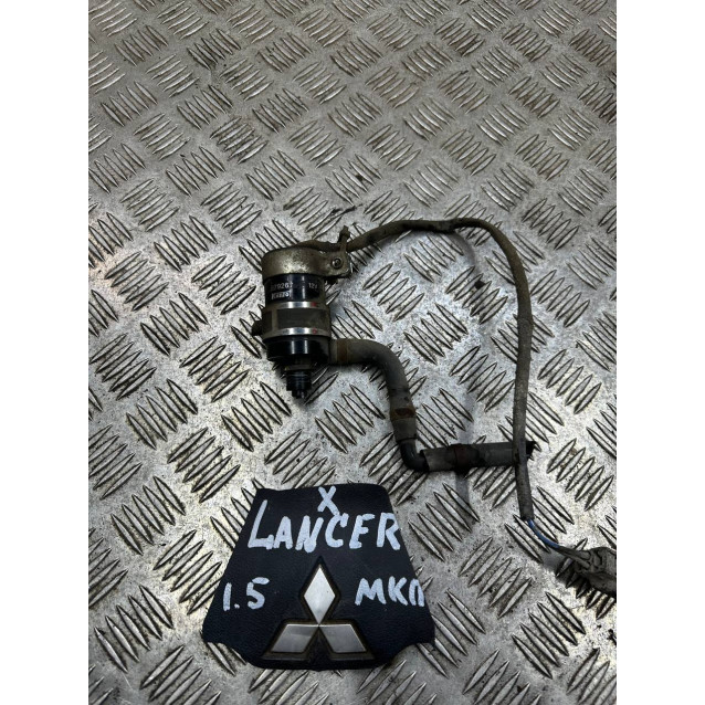 Насос моторчик  омывателя фар Mitsubishi Lancer X (07-13) 8264A081	