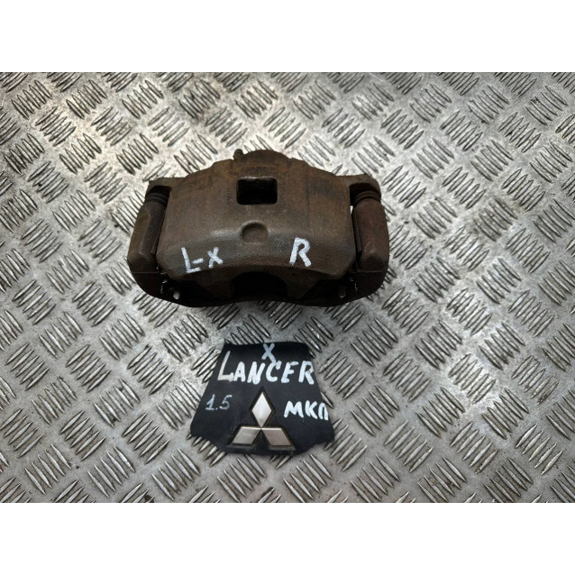 Супорт передній правий Mitsubishi Lancer X (2007-2013) 4605A476 