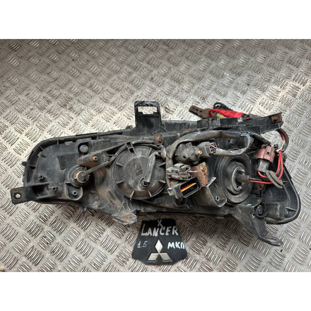 Фара левая Mitsubishi Lancer X (2007-2013) 8107030B62