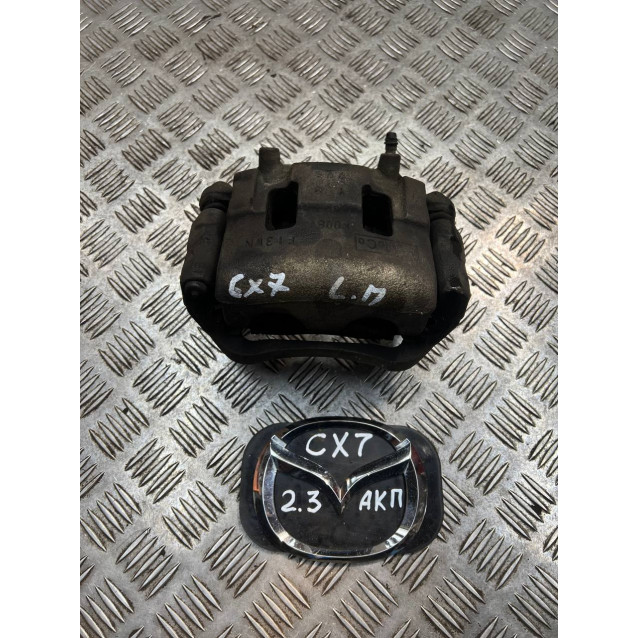 Супорт передній левий Mazda CX-7 (2006-2012) L20633990B