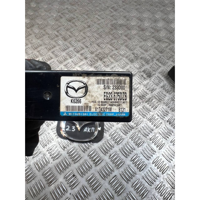 Блок управления центральным замком Mazda CX-7 (2006-2012) EG23675DZB