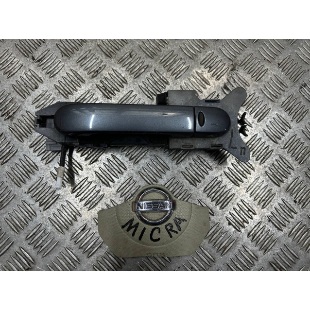 Ручка двери наружная левая передняя Nissan Micra K12 (2002-2011) 80611AX62B
