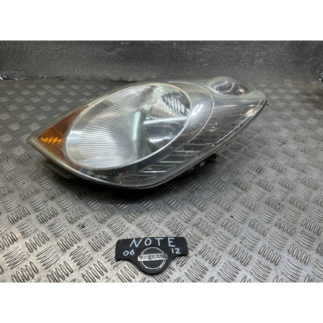 Фара левая Nissan Note E11 (2009-2013) 260609U10A