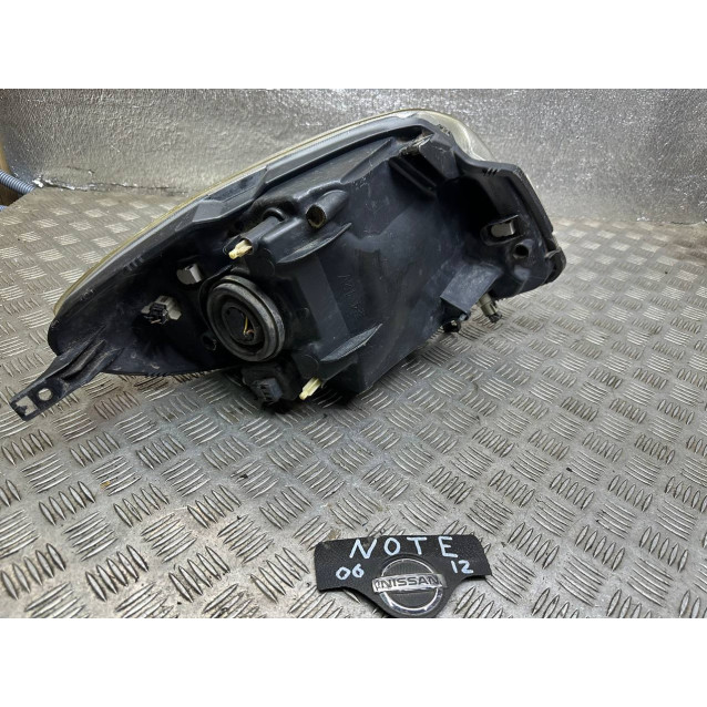 Фара левая Nissan Note E11 (2009-2013) 260609U10A