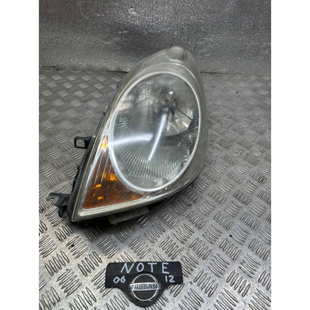 Фара левая Nissan Note E11 (2009-2013) 260609U10A