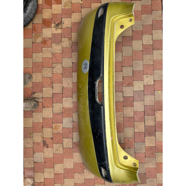 Бампер задний Nissan Note E11 (2006-2013) 850229U040
