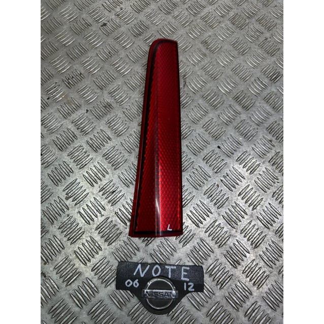 Фонарь отражатель левый Nissan Note E11(2010-2013) 265589U00A