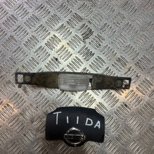 Фонарь Подсветка номера Nissan Tiida (C11) (2007-2013) 265101L000