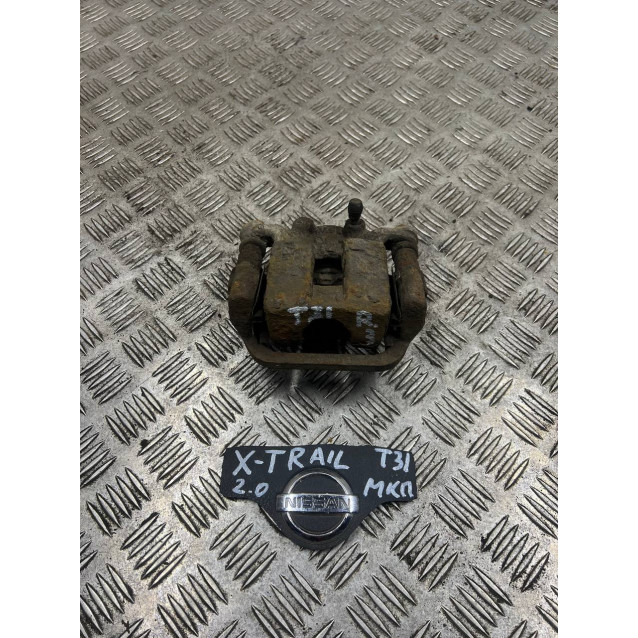 Супорт задний правый Nissan X-Trail T31 (2007-2012) 2.0 МКПП 44001JG00A